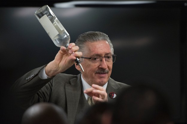 Paul Femia, executive director of training with Unite Here! Bartenders Local #165, teaches students proper drink pouring techniques during an apprentice training program class at the Culinary Academy of Las Vegas.