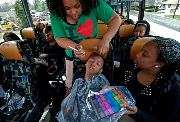 1. Members of the team get made up on the way to a taping in New York City. / 2. The team waits nervously to appear on Dancing with the Stars in 2013.
