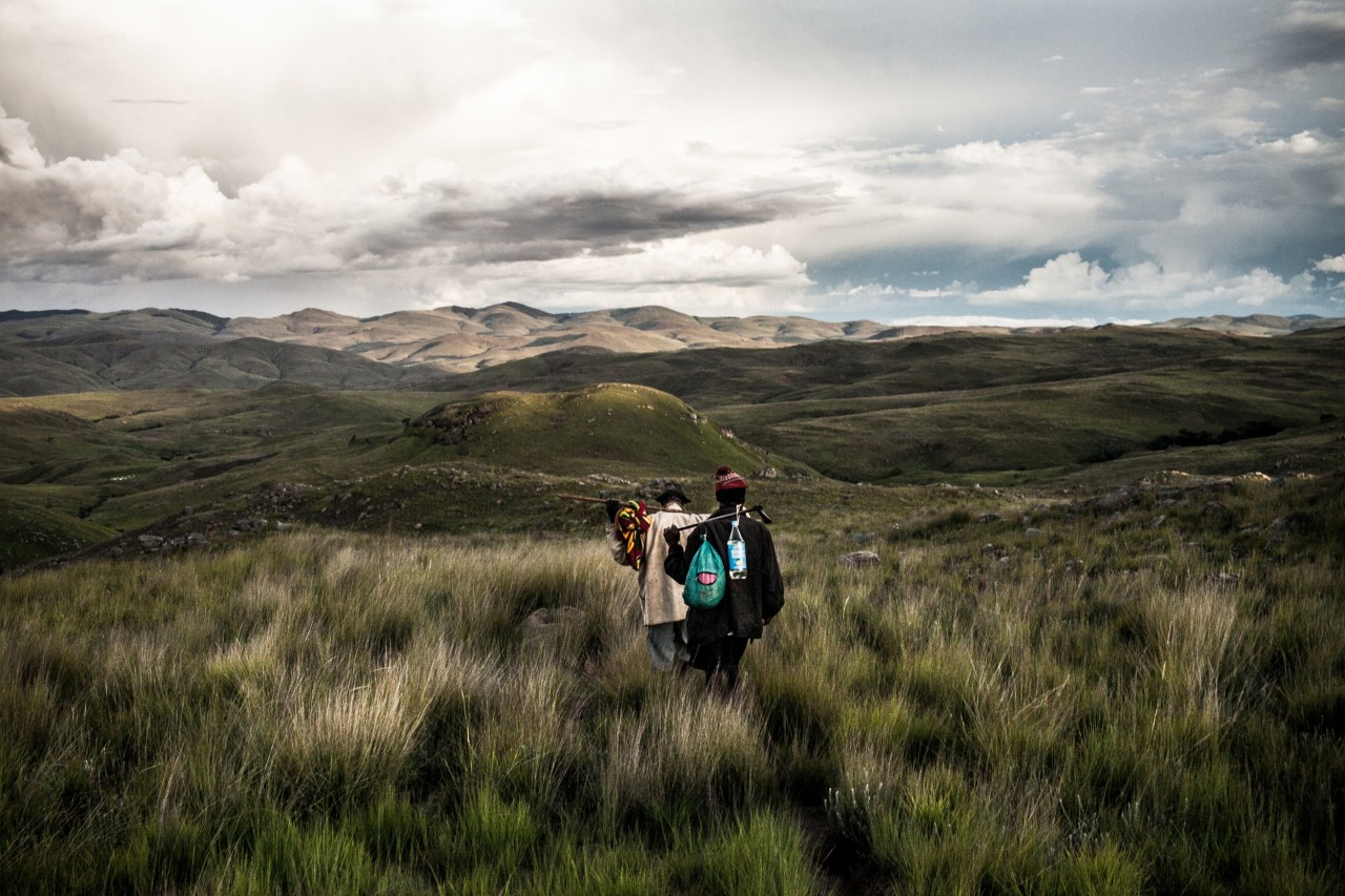 Walking to the villages that were set on fire by the Army, which are only reachable by foot.