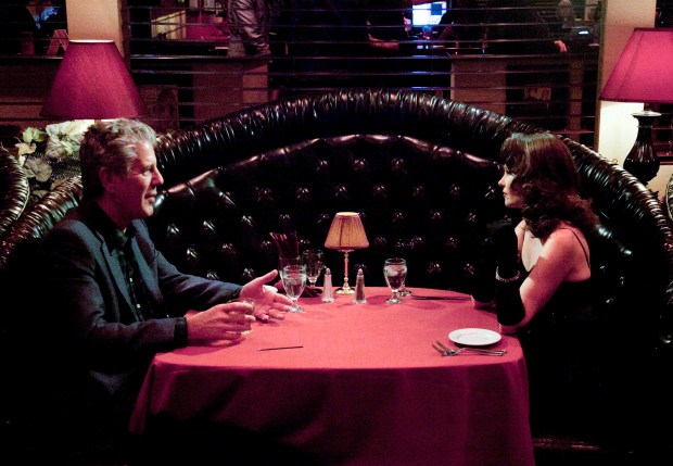 Bourdain dining with Laura Shaffer at The Bootlegger.