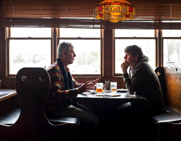 Bourdain with his brother, Christopher, at Kubel's.