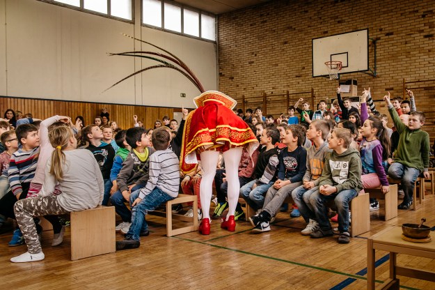 1. The Cologne Carnival is closely connected to the Christian church. During each carnival season they participate in several church services. / 2. Prinz Holger I answers questions from primary school students.