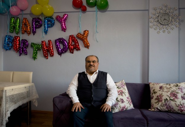 1. Jamal Mamo poses for a portrait in his Istanbul apartment. / 2. The family did not see life in Turkey as a permanent solution.