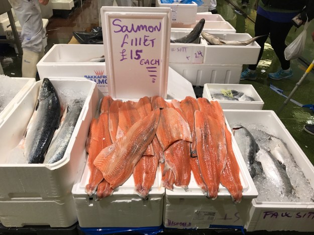 1. Salmon fillets at Billingsate Fish Market. / 2. Traders at Billingsgate Fish Market.