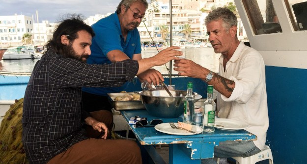 1. Bourdain and Lambros Tryfillis enjoying a drink / 2. Bourdain dines with the in-laws of the regional governor.