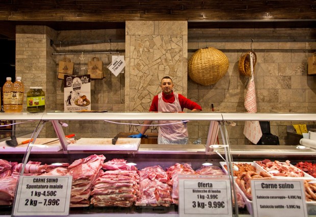 Tiberius Vasile poses for a portrait at the Romanian supermarket La Strada.