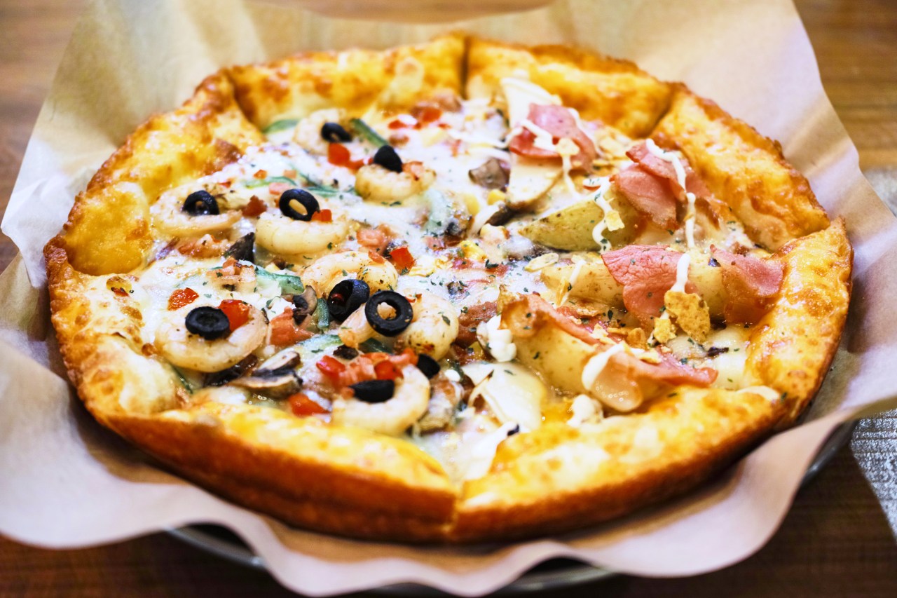 Mr Pizza's "Half Potato Half Shrimp Gold" with a sweet potato mousse crust.