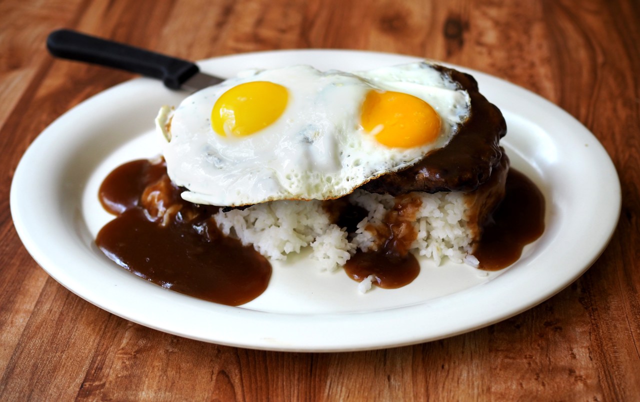 Loco moco: eggs sunny side up, beef patties, rice, and gravy.