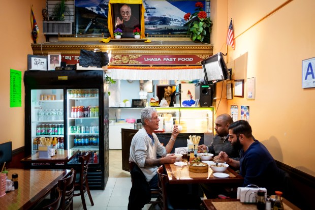 Bourdain with Ali Najmi and Heems at Lhasa Fast Food.