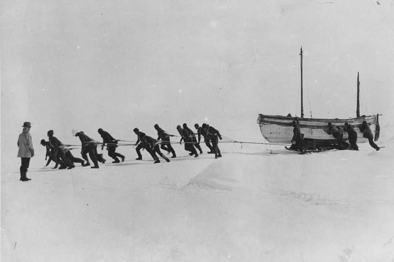 Members of Shackleton's expedition team pull one of their lifeboats across the snow in the Antarctic, following the loss of the 'Endurance'. (Photo by Hulton Archive/Getty Images)