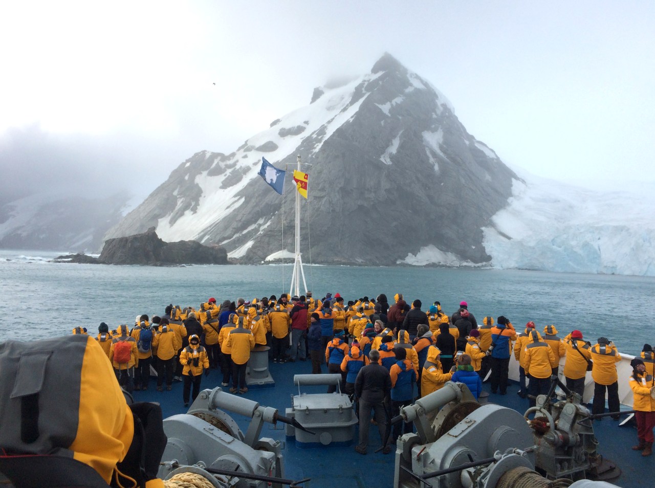 Passengers gather to observe the pittance of rock on Elephant Island.