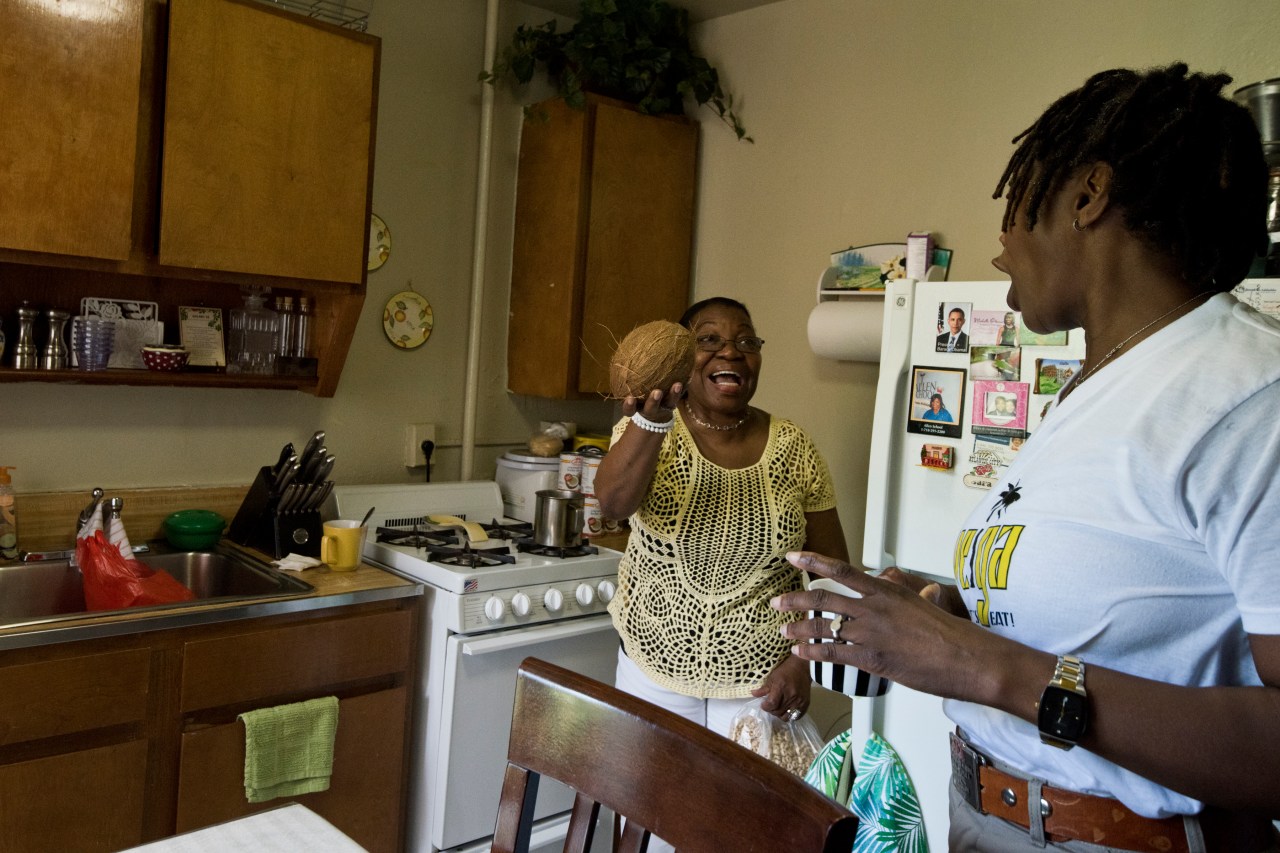 Sara Martinez and Justa Gil in the kitchen.