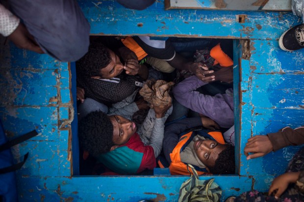 Inside the hold of a large wooden boat with about 400 Eritreans onboard.