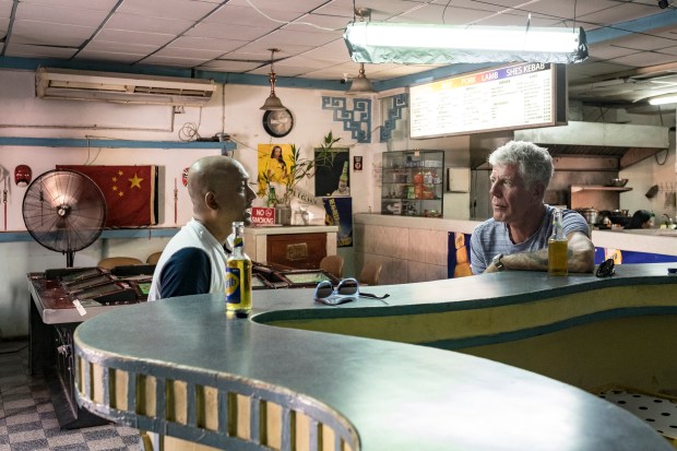 Bourdain with Mark Bassant.