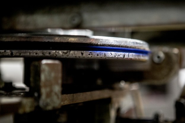 Wax beads are heated and pressed into what is called a puck or a biscuit before being pressed into records.