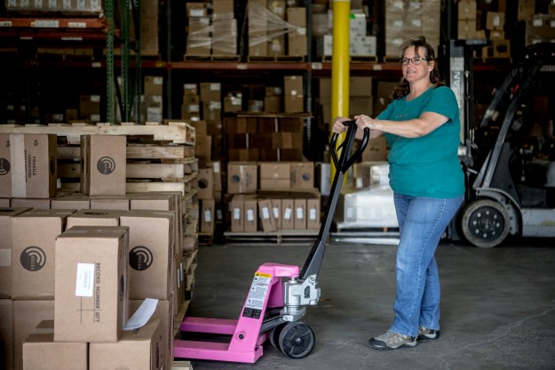 1. Donnie Morris, a print shop employee, has been working with the company for 17 years. / 2. Claudette Bird, a shipping clerk, in the warehouse.