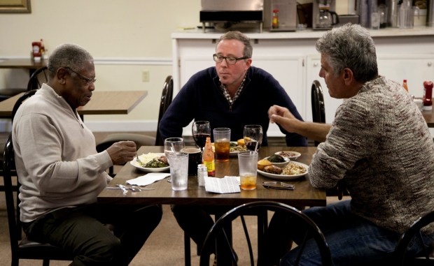 Bourdain and John T. Edge (middle) join Senator Willie Simmons (left) for lunch at his restaurant, "Senator's Place" in Cleveland.