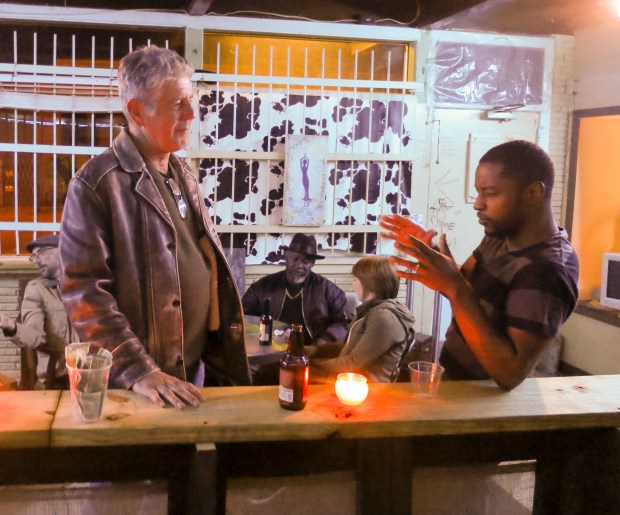 Bourdain with PyInfamous at Soul Wired Café.