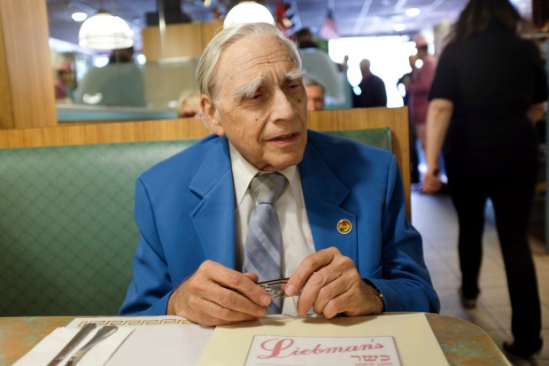 Lloyd Ultan awaits his meal at Liebman's.