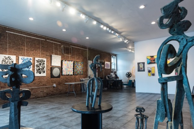1.The facade of Wallworks features a mural by Crash and Bio, two legendary Bronx artists. / 2. Sculptures by Keon are part of Wallworks Summer Abstraction exhibit.