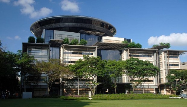 The Supreme Court Building in Singapore, designed by Foster and Partners. The disc at the top of the building houses the courtroom of the Court of Appeal, Singapore's final appellate court. (Photo by Terence Ong)