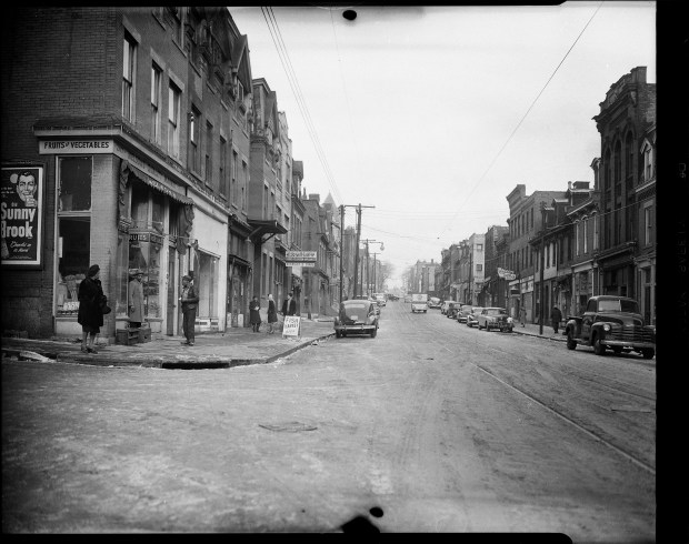 Nelson's Quality Market, Crosley Appliances, and Mason's Cafe on Wylie Avenue at the intersection of Trent Street in the Hill District. c. 1946 - 1960. (Photo by Charles 'Teenie' Harris/Carnegie Museum of Art via Getty Images)