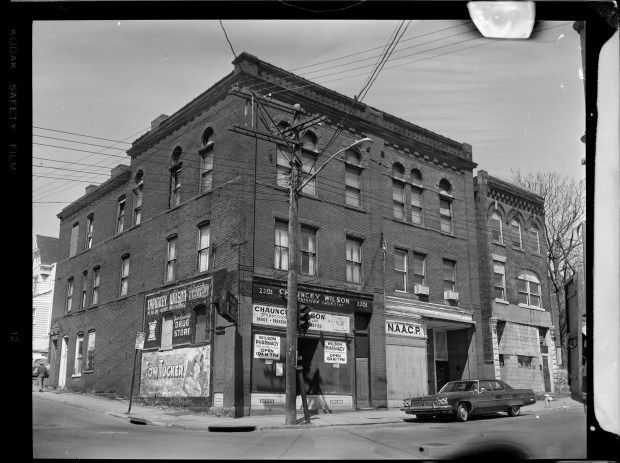 A building housing the local NAACP branch and Chauncey Wilson Pharmacy on Wylie Avenue and Kirkpatrick Street in the Hill District in 1969. (Photo by Charles 'Teenie' Harris/Carnegie Museum of Art via Getty Images)