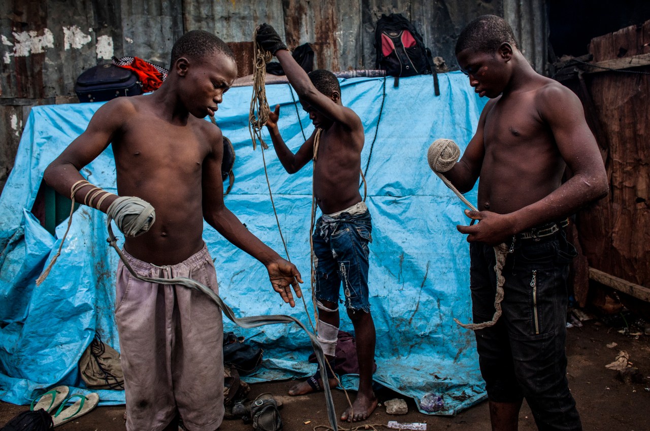 Young boxers prepare for their match.