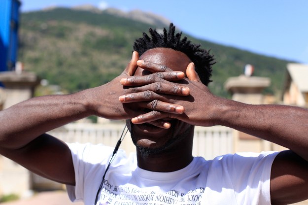 1. Daily lunch distribution by volunteers at the parish of Briançon. / 2. An asylum seeker.