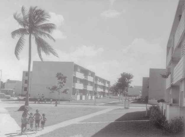 1. Multiple-dwelling public housing units like this modern group are found in the outskirts of the cities and towns. / 2. A 12-acre tract near San Juan when construction was beginning on houses for 131 families as part of a works relief and slum clearance project, the first public housing in Puerto Rico. (Both photos by Bettmann via Getty Images)