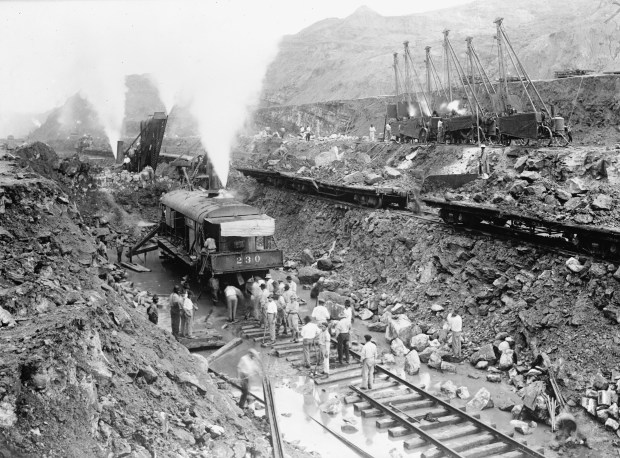 Steam shovel trains excavate the channel of the Panama Canal c. 1913 (Photo by Buyenlarge via Getty Images)