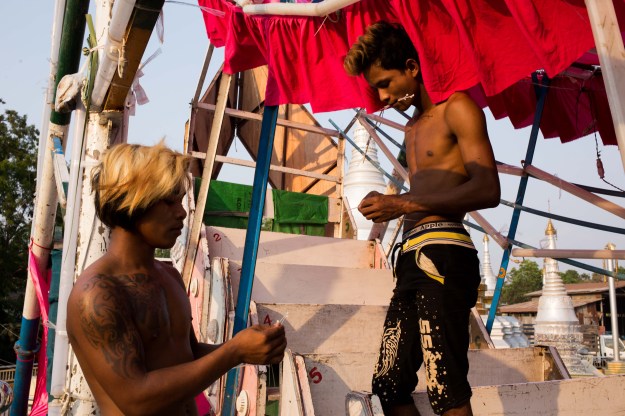 About 20 people between 17 and 70 years old, including technicians, cooks, Ferris wheel operators, and accountants, work for the Myint Thamada group.