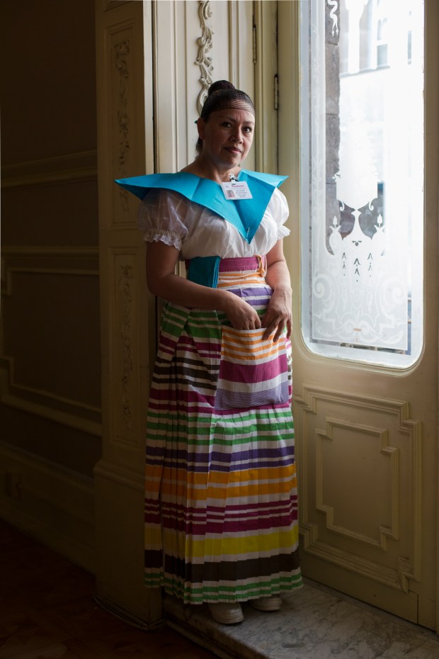 An employee in traditional dress at Sanborn’s