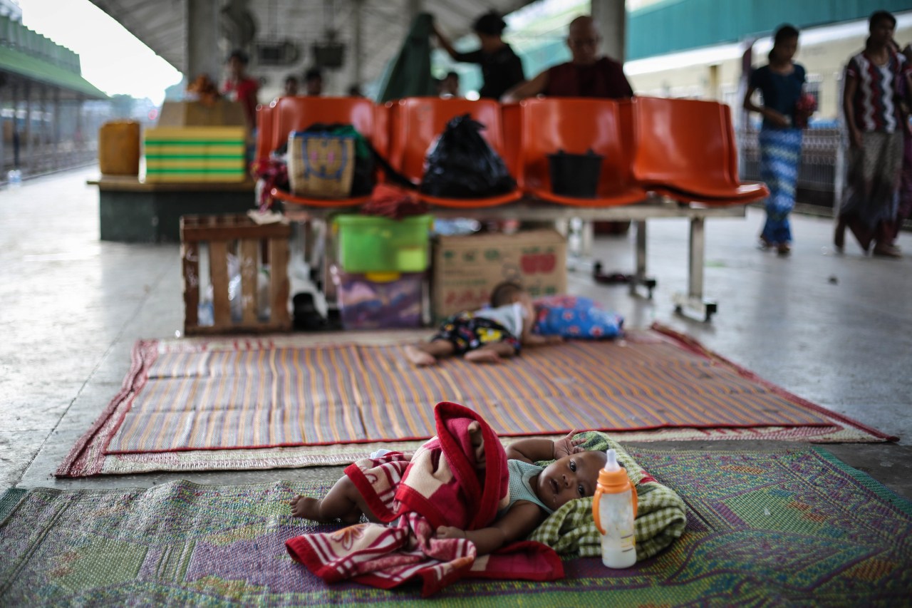 Trains are frequently hours late. Many travelers spend all day waiting for their train. Those who are well-­prepared bring food and floor mats to rest on.