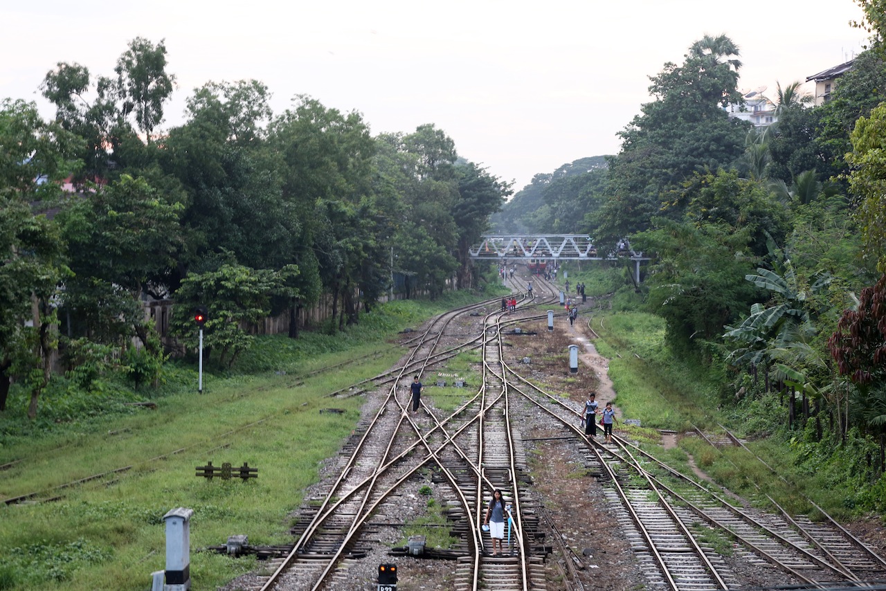 Yangon residents often use the train tracks to cut through the traffic chaos of Myanmar’s biggest city to reach their homes.
