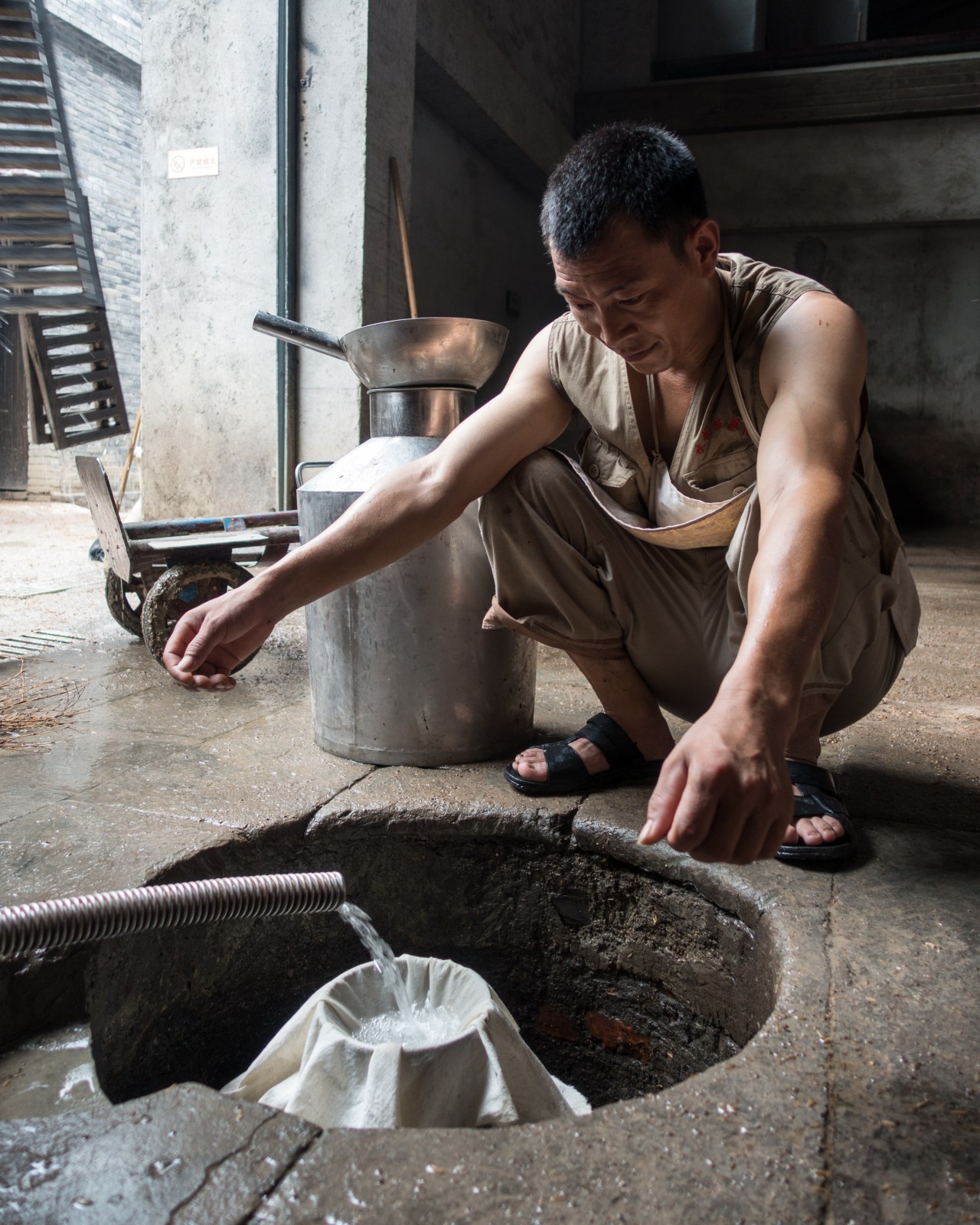 Raw distilled spirits are collected at the Shui Jing Fang Museum.