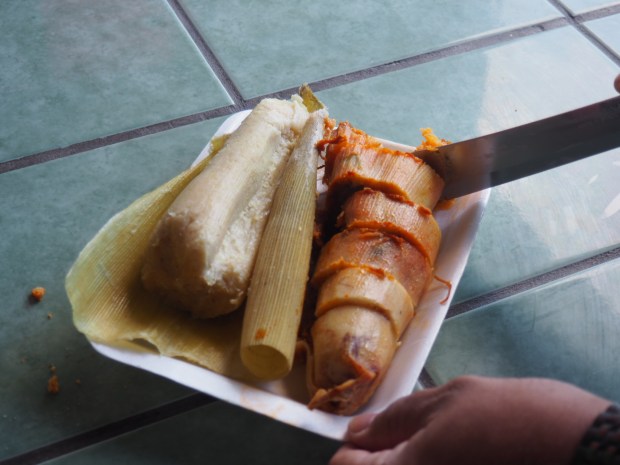 Cutting corn tamales in Rosarito, Mexico. (Photo by Jackie Bryant)