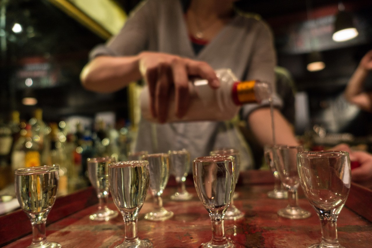 A server pours a Baijiu tasting at Capital Spirits.