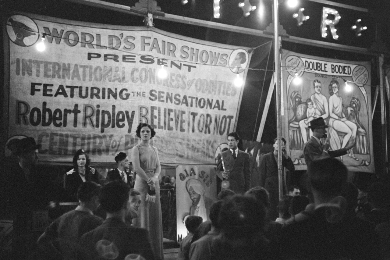 The yearly “Believe it or Not” carnival entertains a crowd in Granville, September, 1938. Photo by Marion Post Wolcott.