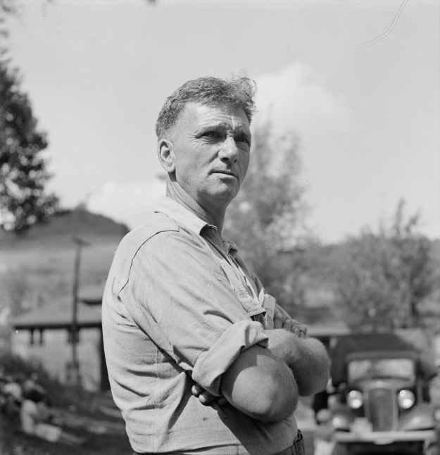 An unemployed coal miner in Scotts Run, September 1938. Abandoned homes in Twin Branch, September, 1938. They were originally built for workers at a mine owned by Ford, but when the workers began to form a union, Ford shut down the mine. The workers, which Wolcott estimated at 1000 men, were forced from the homes. Photos by Marion Post Wolcott.