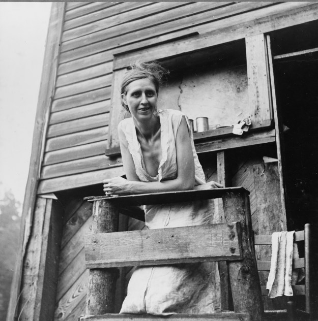 Photo 1: A miner's wife on the porch of their home, an abandoned company store in Pursglove, 1938. Photo 2: Miners eating ice cream. Photos by Marion Post Wolcott.