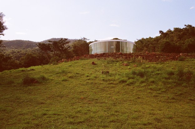 Photo 1: Visitors and Inhotim staff mill about near Olafur Eliasson’s “By Means of a Sudden Intuitive Realization.” Photo 2: Doug Aitken’s Sonic Pavilion, known informally to Inhotim’s visitors as “The Sounds of the Earth.”