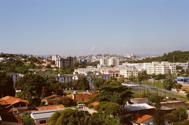 Photo 1: Pampulha neighbourhood, Belo Horizonte. Photo 2: Swans glide by on one of Inhotim’s tinted ponds. A benign colorant has been added to mask the reddish hue of the area’s iron-rich water.