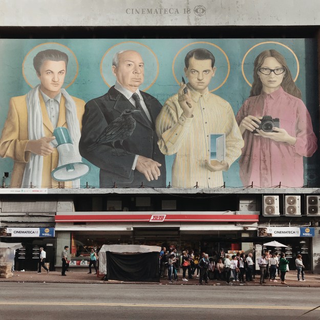 People going about their day in downtown Montevideo.