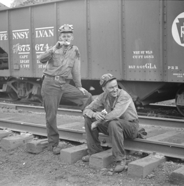 Photo 1: A miner's wife on the porch of their home, an abandoned company store in Pursglove, 1938. Photo 2: Miners eating ice cream. Photos by Marion Post Wolcott.
