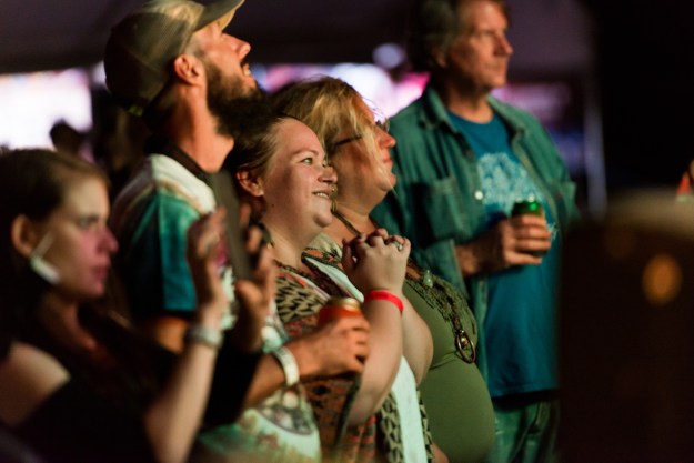 Photo 1: Fans enjoy the music at Harfest. Photo 2: Danny Moore of the Brokedown Hustlers.