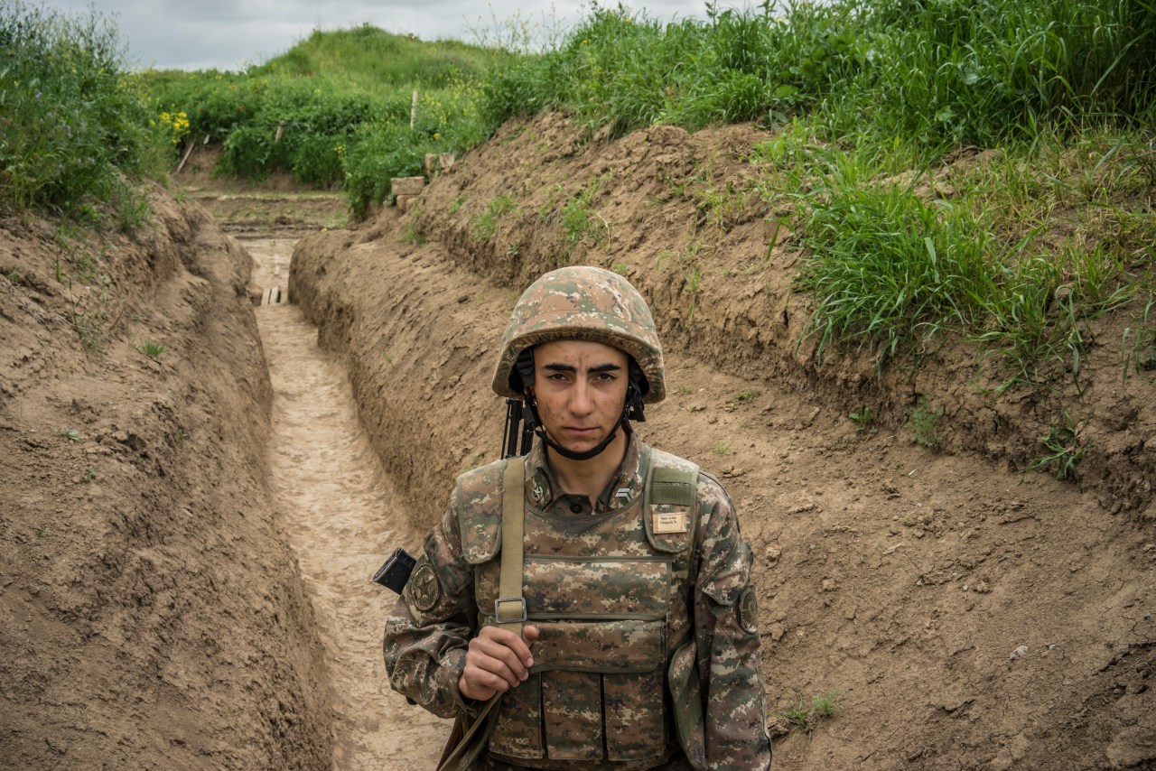 A member of the armed forces of Nagorno-Karabakh along the line of contact with Azerbaijani forces near the town of Agdam.