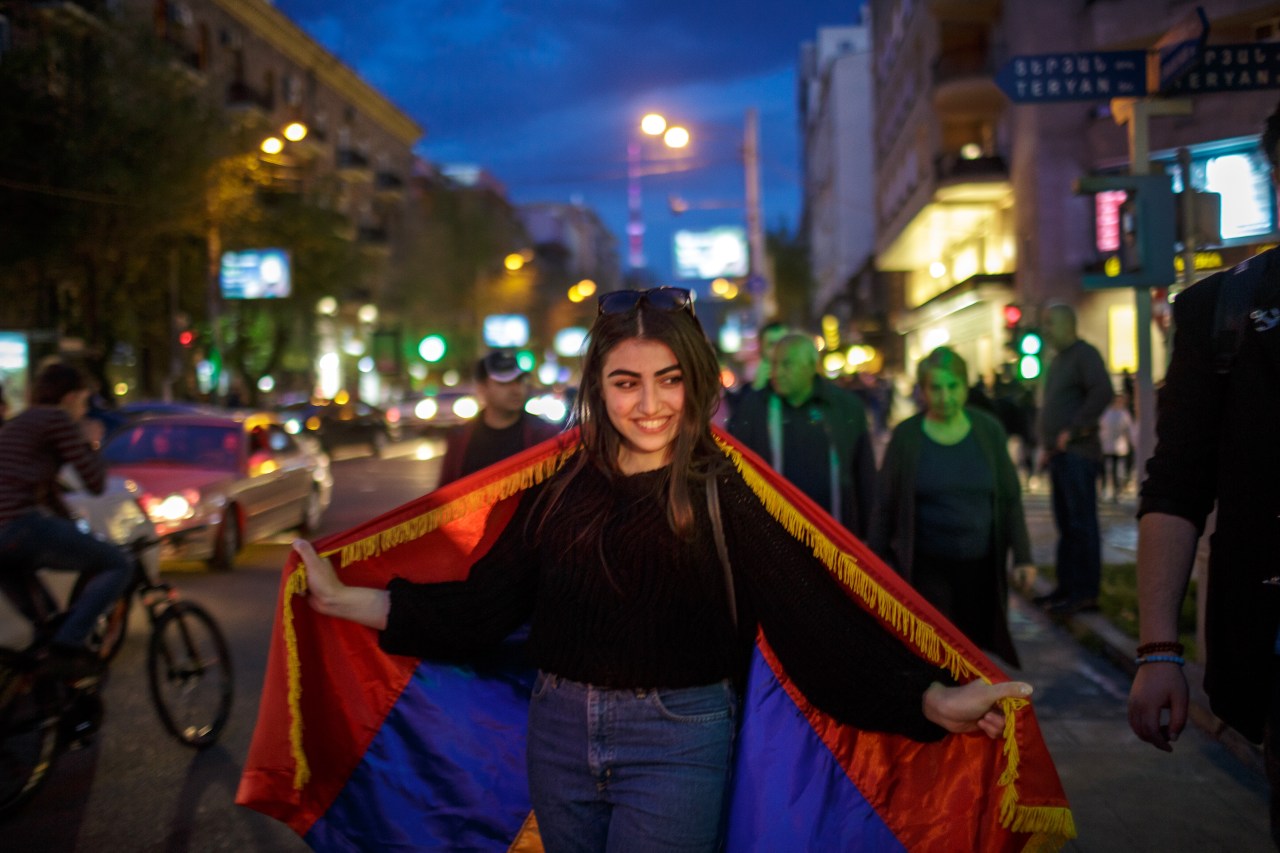 People celebrate in central Yerevan after Prime Minister Sargsyan announced his resignation. Photo by Hossein Fatemi.