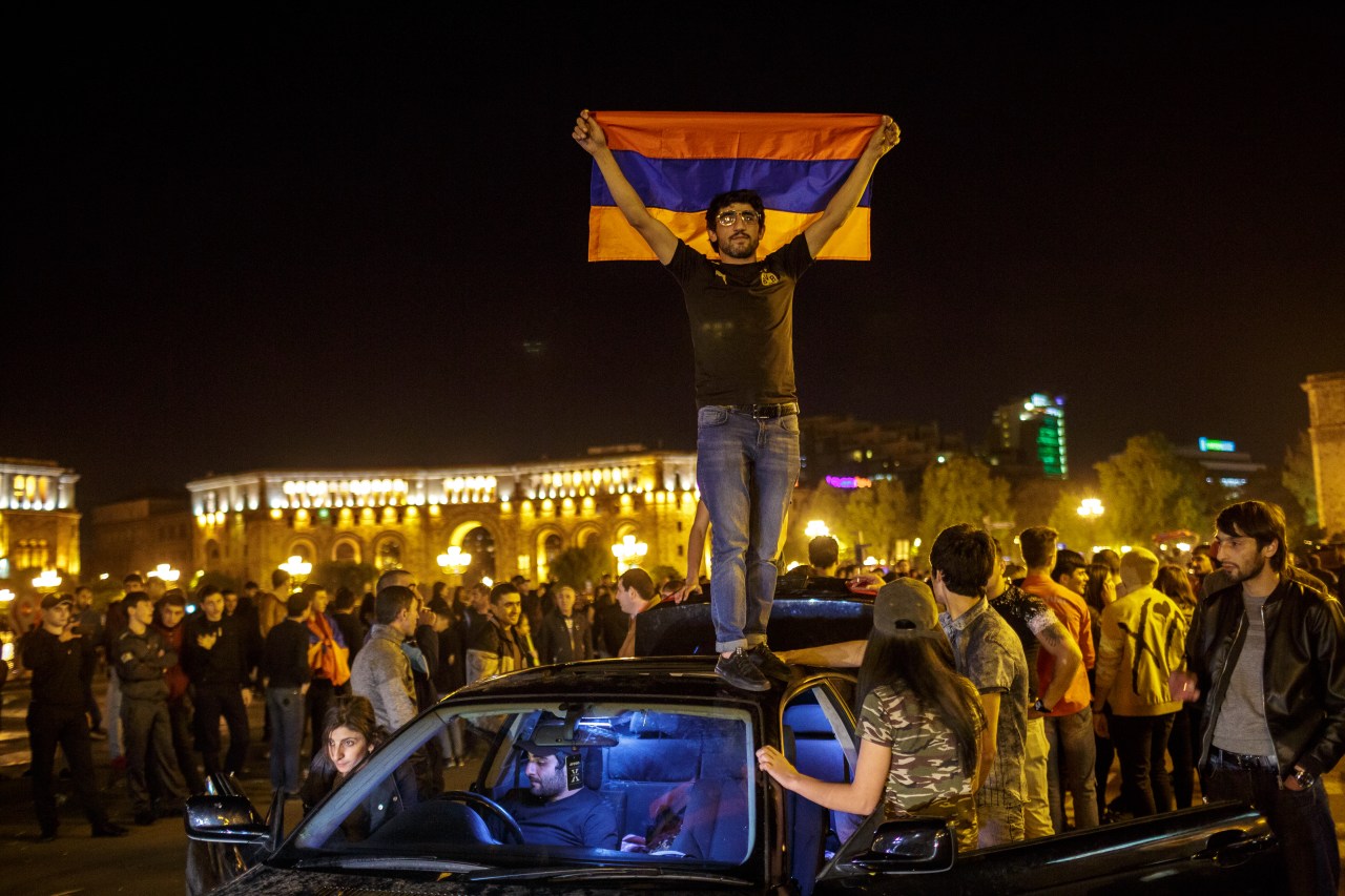 People celebrate in Yerevan's Republic Square after Prime Minister Sargsyan announced his resignation.