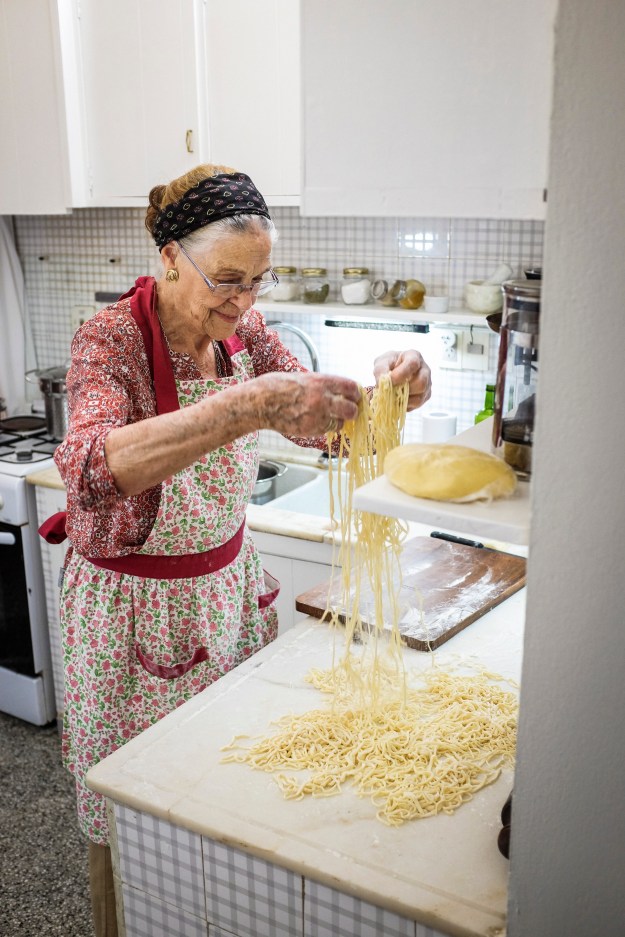 Chef Nacho and his grandmother Ercilia, making tuco with fresh tallarin.